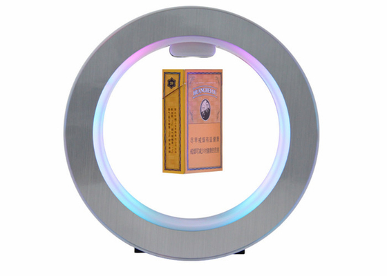 Le présentoir de lévitation magnétique de cigarette absorbent automatiquement la protection